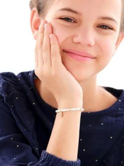 Bransoletka dla dziecka z mosiądzu pozłacana z muszlą i cyrkoniami - słoń