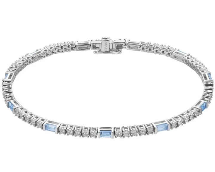 Bransoletka z białego złota z brylantami i topazami - próba 585