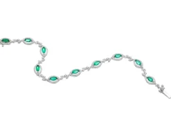 Bransoletka z białego złota z brylantami i szmaragdami - 19 cm - próba 585