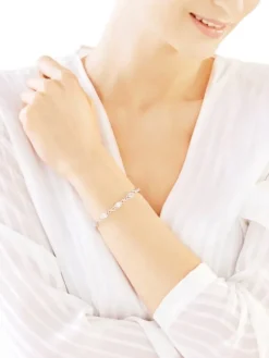 Bransoletka z białego złota z diamentami i topazami białymi - 18 cm - próba 375