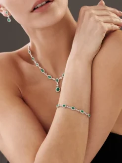 Bransoletka z białego złota z brylantami i szmaragdami - 18 cm - próba 585