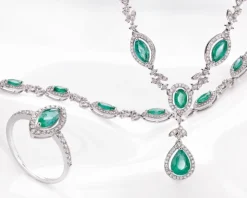 Bransoletka z białego złota z brylantami i szmaragdami - 18 cm - próba 585