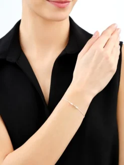 Bransoletka z cyrkoniami i elementami z żółtego złota - kulki