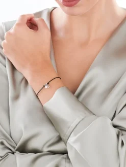 Bransoletka z elementami srebra - litera G, serce