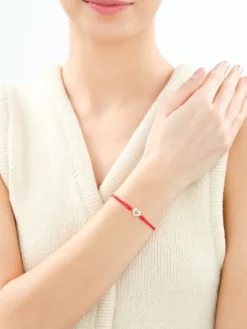 Bransoletka z elementami srebra - serce, łapka