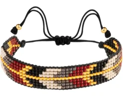 Bransoletka z elementami z żółtego złota i koralikami