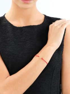 Bransoletka z elementami srebra - litera A, motyl