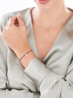 Bransoletka z elementami srebra - litera R, serce