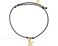 Bransoletka z elementami srebra - litera K, motyl