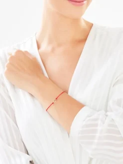 Bransoletka z elementami żółtego złota i diamentem - serce - 0,004 ct - próba 375