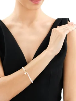 Bransoletka z elementami z żółtego złota - perły