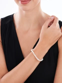 Bransoletka z elementami z żółtego złota - perły