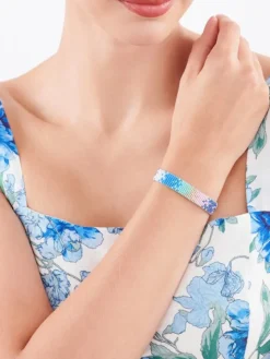 Bransoletka z elementami z żółtego złota i koralikami