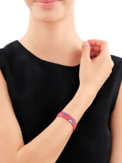 Bransoletka z elementami z żółtego złota i koralikami