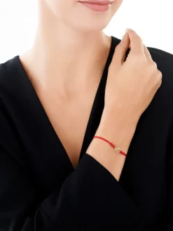 Bransoletka z elementami żółtego złota i diamentem - kwiat lotosu - 0,008 ct - próba 375