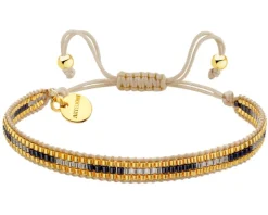 Bransoletka z elementami z mosiądzu pozłacanego i szklanymi koralikami