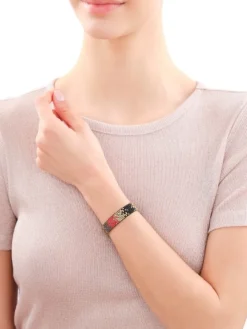 Bransoletka z elementami z żółtego złota i koralikami