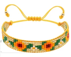 Bransoletka z elementami z żółtego złota i koralikami - kwiaty