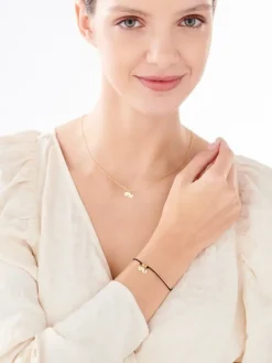 Bransoletka z elementami srebra - litera M, koniczyna