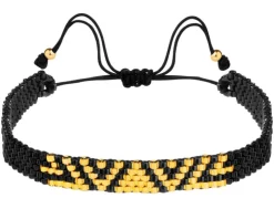 Bransoletka z elementami z żółtego złota i koralikami