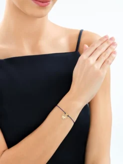 Bransoletka z elementami srebra - samolot, kula ziemska