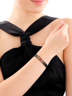 Bransoletka z elementami z żółtego złota i koralikami - serce