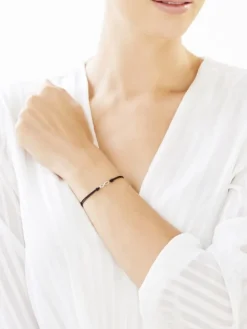 Bransoletka z elementami białego złota i diamentem - nieskończoność - 0,004 ct - próba 375