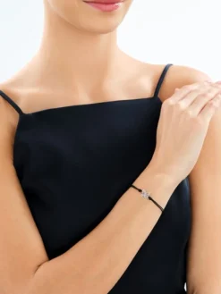 Bransoletka z elementami srebra - litera K, motyl