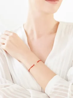 Bransoletka z elementami żółtego złota i diamentem - nieskończoność - 0,004 ct - próba 375