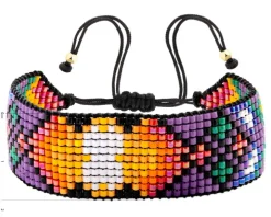 Bransoletka z elementami z żółtego złota i koralikami