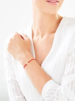 Bransoletka z elementami żółtego złota i diamentem - 0,004 ct - próba 375