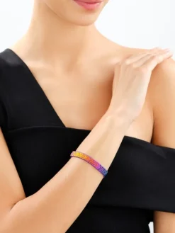 Bransoletka z elementami z mosiądzu pozłacanego i szklanymi koralikami