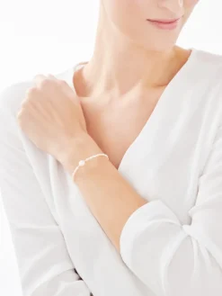 Bransoletka z elementami z żółtego złota - perły