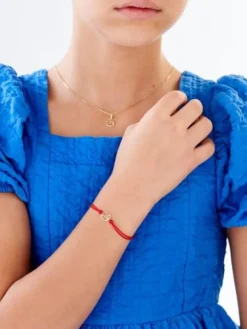 Bransoletka z elementami żółtego złota i diamentem - litera M - 0,003 ct - próba 375