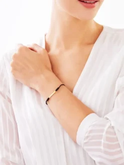 Bransoletka z elementami żółtego złota i diamentem - krzyż - 0,005 ct - próba 375