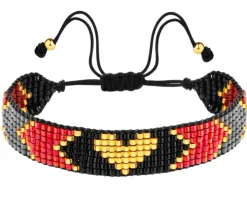 Bransoletka z elementami z żółtego złota i koralikami - serce