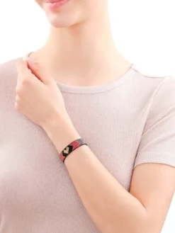 Bransoletka z elementami z żółtego złota i koralikami - serce