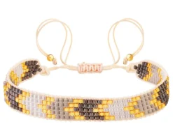 Bransoletka z elementami z żółtego złota i koralikami