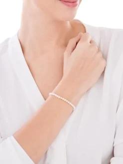 Bransoletka z elementami z żółtego złota - perły