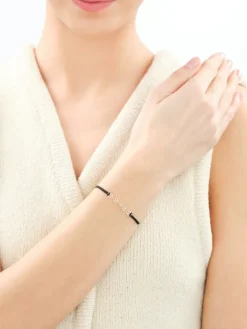 Bransoletka z emalią i elementami z żółtego złota - kwiaty