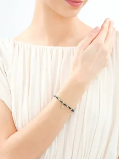 Bransoletka z mosiądzu pozłacana z kamieniami jubilerskimi, masą perłową i emalią - słoń