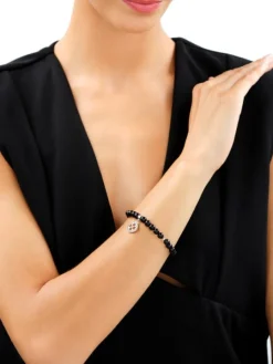 Bransoletka z mosiądzu pozłacana z agatami i emalią - koniczyna