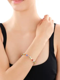 Bransoletka z mosiądzu pozłacana ze szklanymi detalami - kwiatki