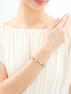 Bransoletka z mosiądzu pozłacana z agatami, masą perłową i tygrysim okiem