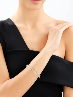 Bransoletka z mosiądzu pozłacana z cyrkoniami i szklanymi detalami - serce