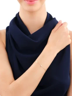 Bransoletka z żółtego i białego złota z brylantem - serce - 0,01 ct - próba 585