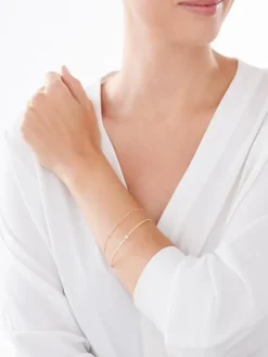 Bransoletka z żółtego i białego złota z brylantem - 0,03 ct - próba 585