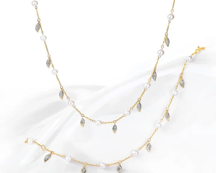 Bransoletka z żółtego złota z diamentami i perłami - próba 375