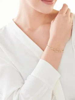 Bransoletka z żółtego złota z diamentami - liście - 0,03 ct - próba 375