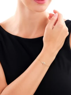 Bransoletka z żółtego złota z diamentami - róża - 0,02 ct - próba 375